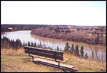 bench with a view of
the Saskatchewan River in 
south-west Edmonton.  The 
path goes down a hill on 
the right and then follows 
the river -  164 kb